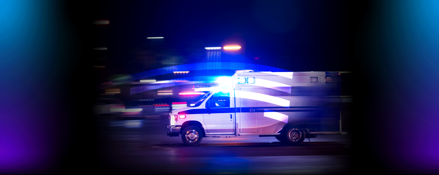 Moving ambulance with flashing lights