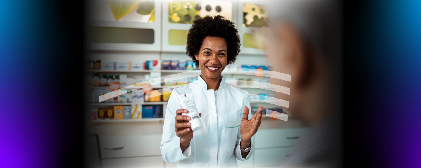 Female pharmacist giving patient prescription 