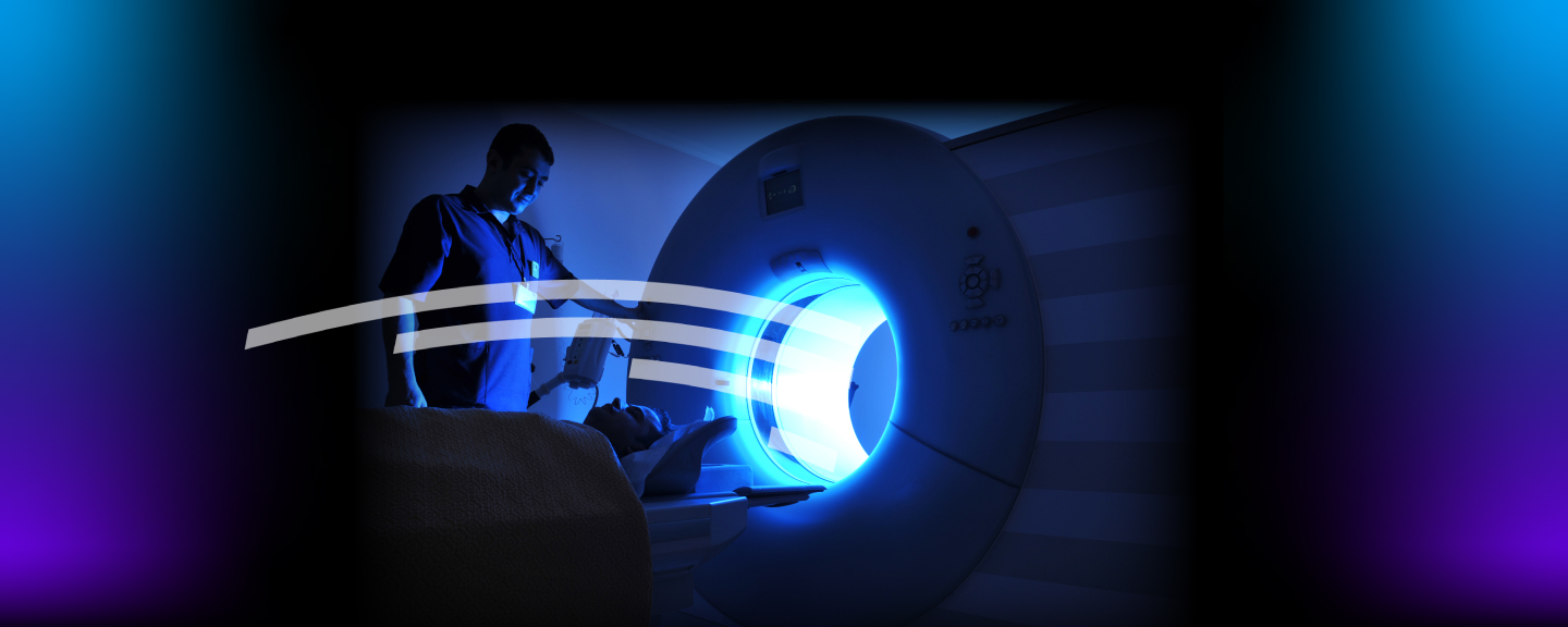 Tech operating MRI machine