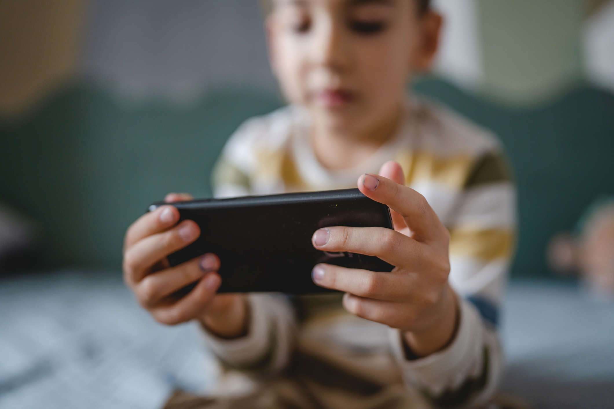 child using a smartphone