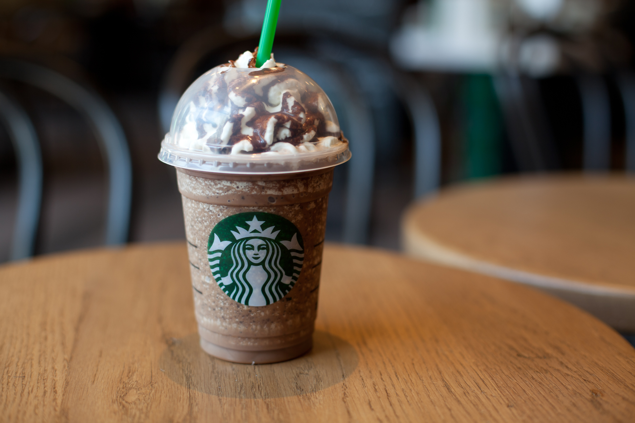 Starbucks cup sitting on restaurant table