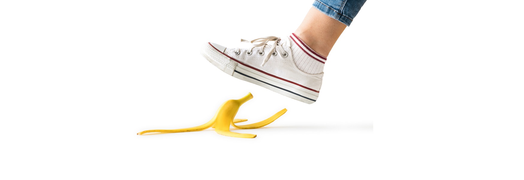 Girl stepping on banana peel 