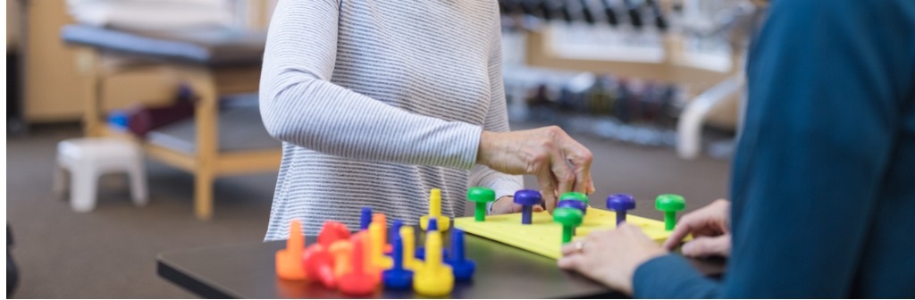 Two elderly women playing board game