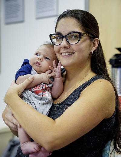 New mom holding baby 