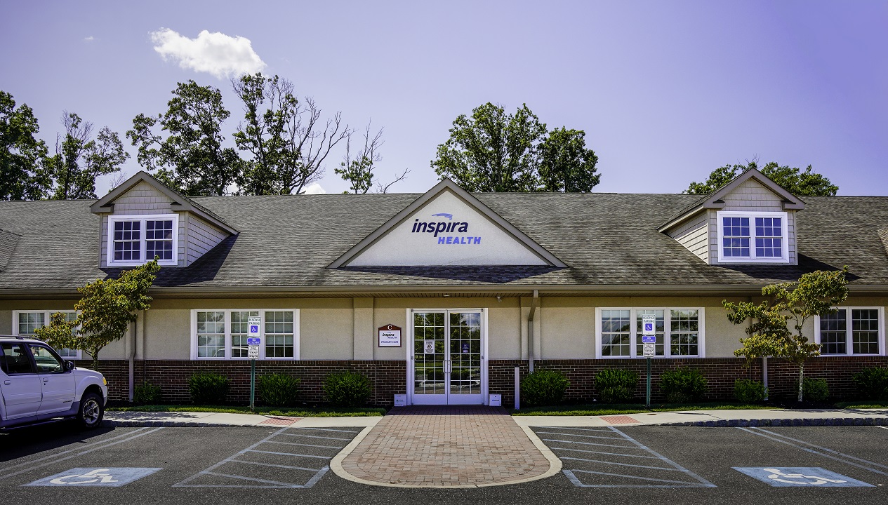 A hospital building with signage 'Inspira Health'