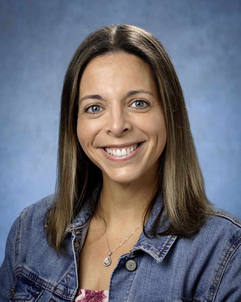 Professional headshot of a Woman