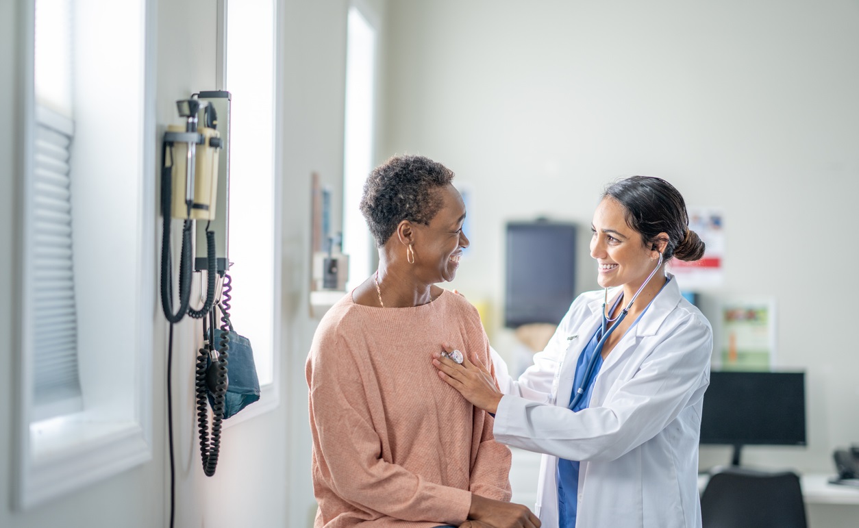 Female doctor consulting patient 