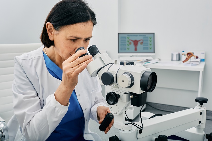 Doctor using Colposcopy instrument