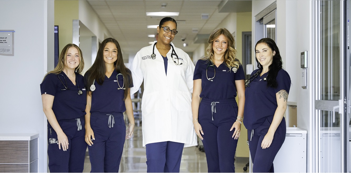 group of nurses posing for a picture