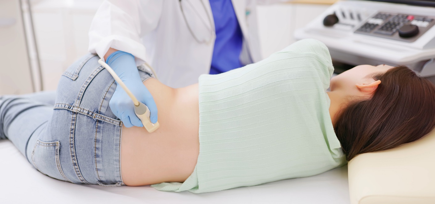 Doctor doing kidney test on Patient