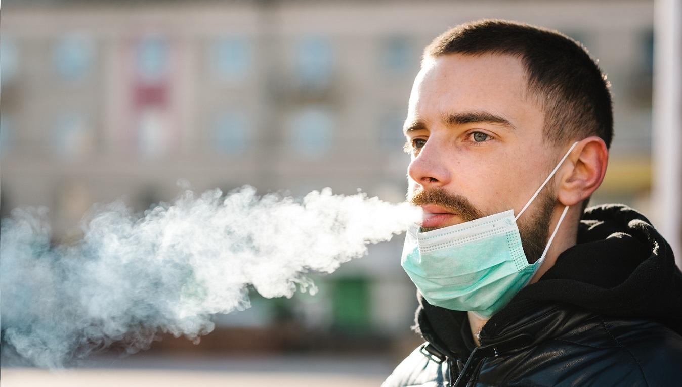 Young man smoking 