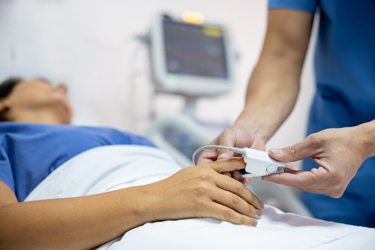 Doctor helping patient