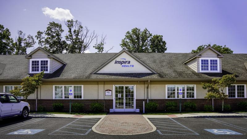 A hospital building with signage 'Inspira Health'