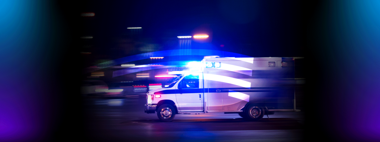 Moving ambulance with flashing lights
