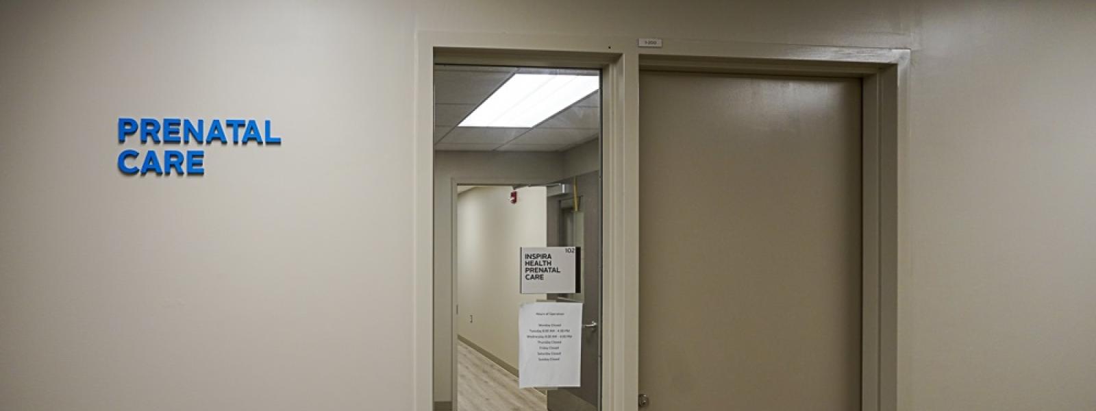 Clinic entrance that reads "Prenatal Care"