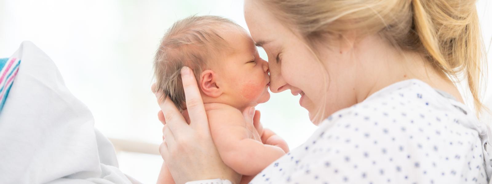 New mom holding her baby