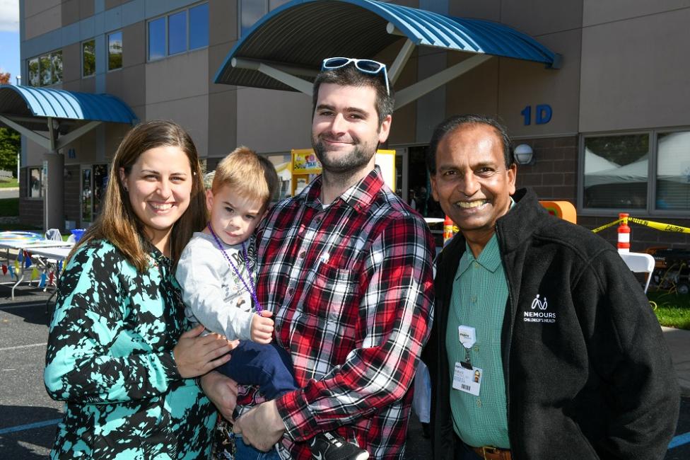 (Right) Neonatologist Horace Ramdial, M.D., reconnects with the Enders family. Little Joseph spent time in the NICU in early 2020