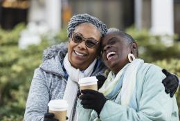 Elderly women laughing together