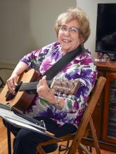 Portrait shot of a women with guitar