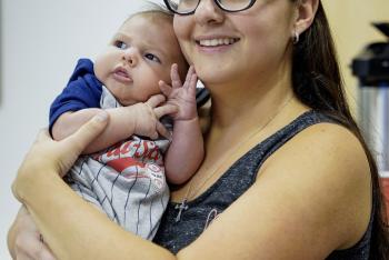 New mom holding her baby 