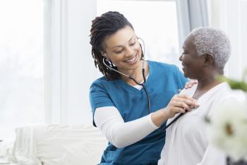 Nurse checking patient lung health